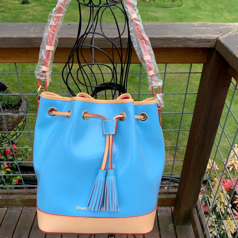 NWT Dooney & Bourke Lt Blue Leather with Patent Coating Drawstring Handbag